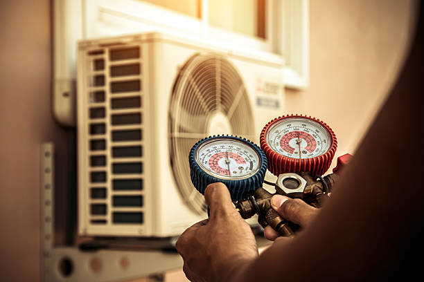 Professional Air Conditioning Service technician working in Cleburne, TX
